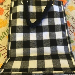 Wine bag holds four bottles or so I’ve been told